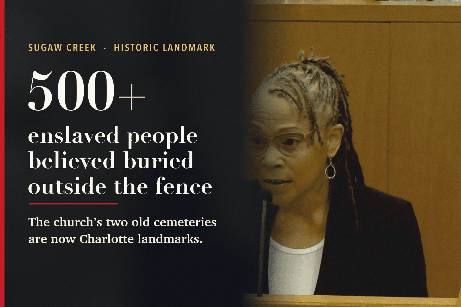 Dr. Julia Robinson Moore speaks at a lectern in the Charlotte City Council chamber beside text reading 500+ enslaved people believed buried outside the fence.