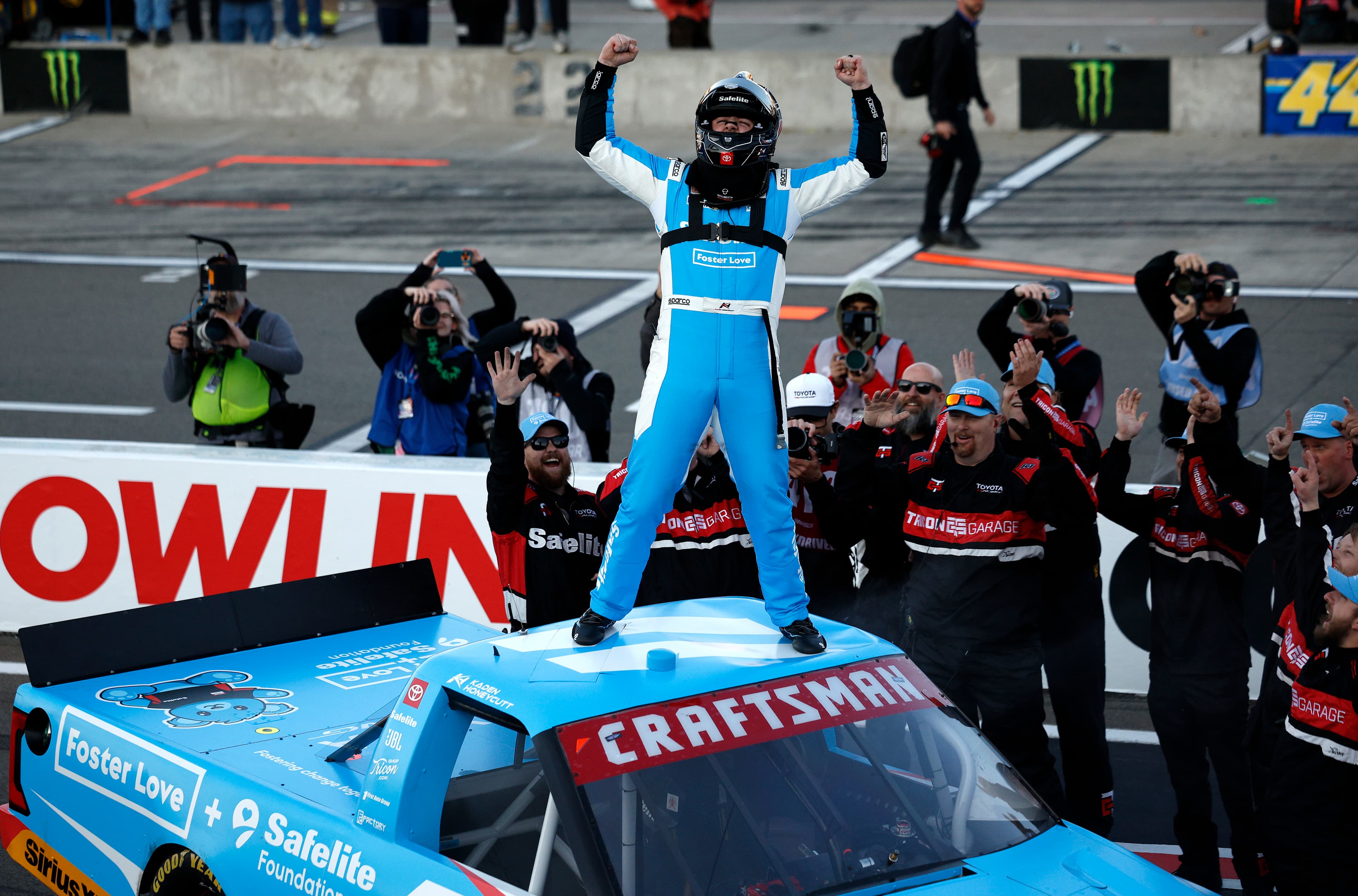 Kaden Honeycutt stands atop his No. 11 TRICON Garage Toyota celebrating his first NASCAR Craftsman Truck Series win at Watkins Glen International on May 8, 2026.